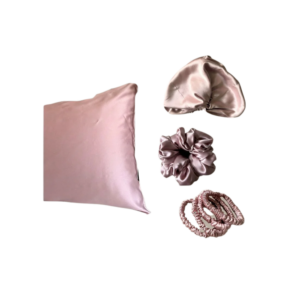 Ultimate silk hair care bundle in blush pink: silk pillowcase, silk hair bonnet, silk scrunchies and silk hair ties
