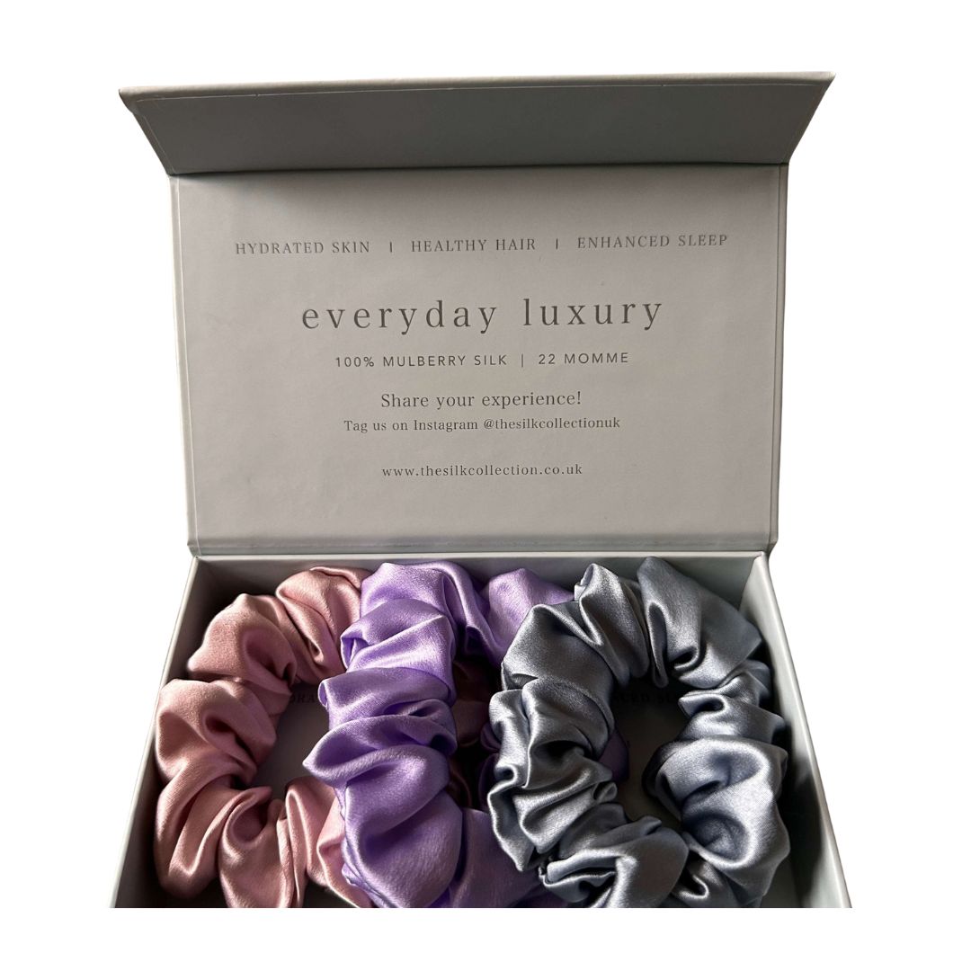 Classic silk scrunchies set of three in the Summer Collection: blush pink, lilac and steel grey 100% mulberry silk scrunchies in a gift box