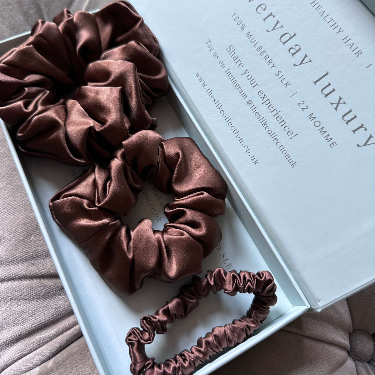 Chocolate brown and dusty rose silk scrunchies with skinny silk hair ties in the starter set gift box