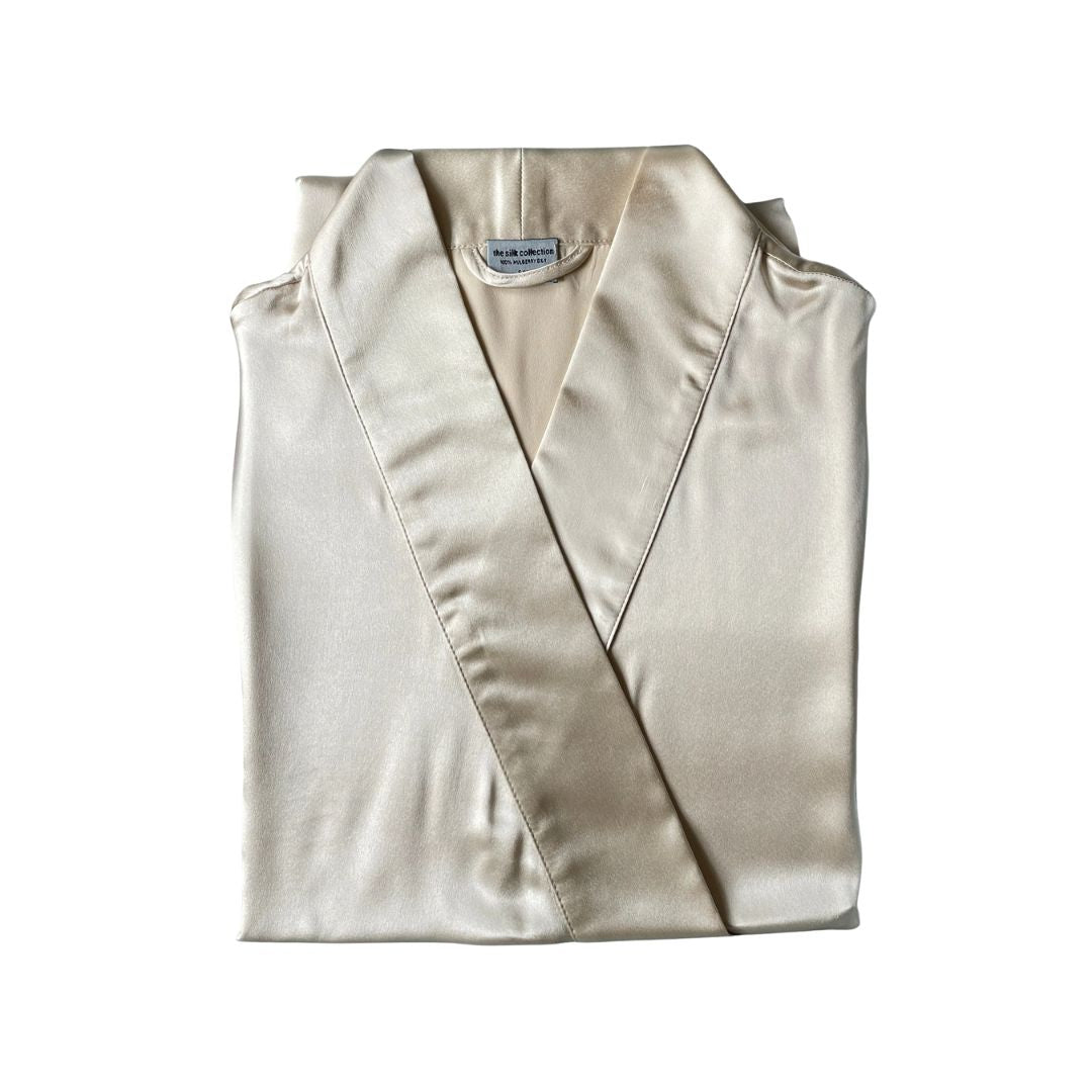 Champagne pure silk robe folded, a 100% mulberry silk dressing gown