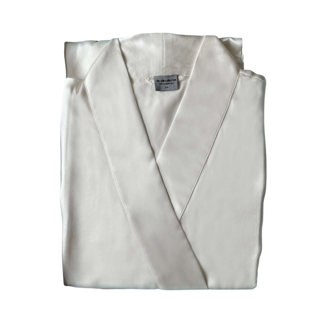 Pearl white pure silk robe folded, a 100% mulberry silk dressing gown