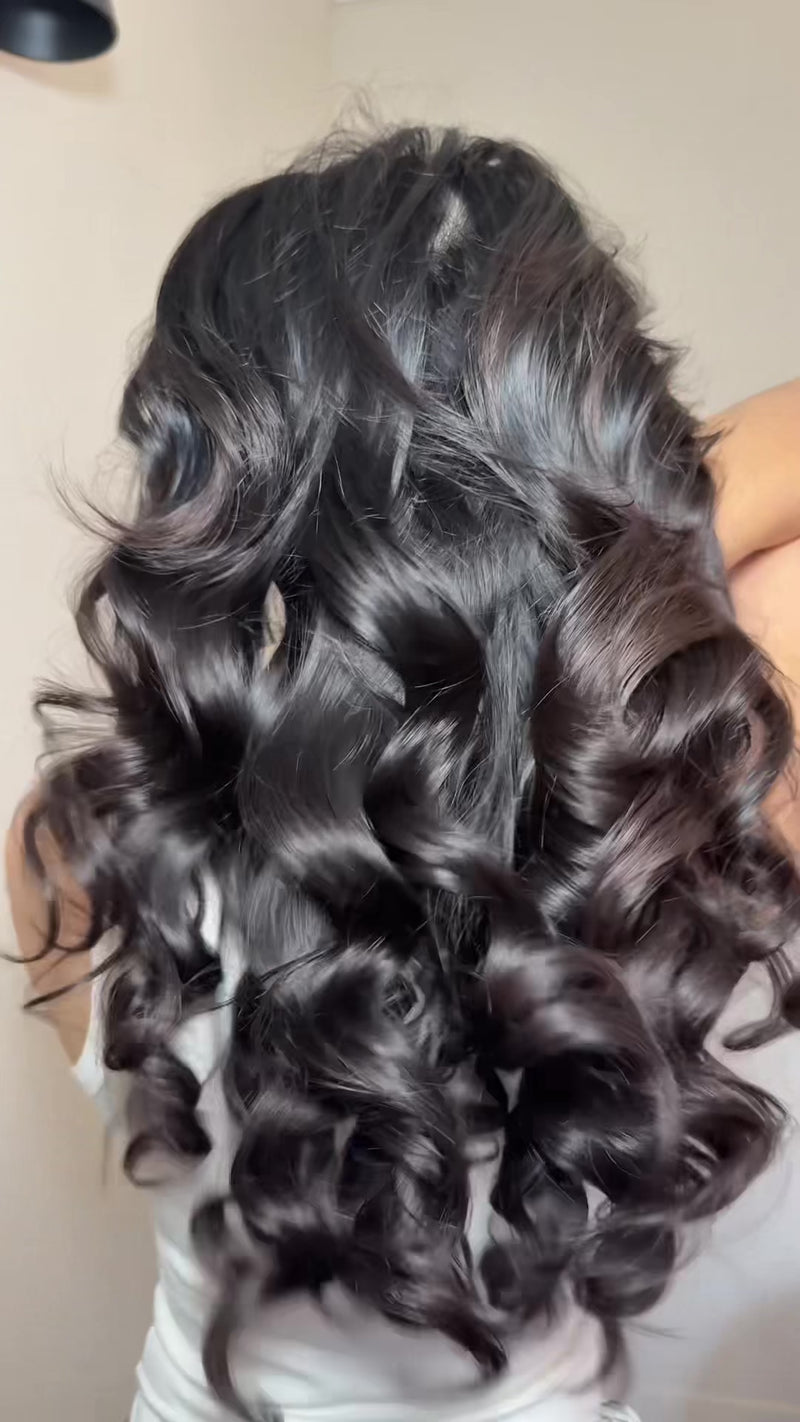 Ploy shows her heatless curl results, then how she wraps the silk heatless curler